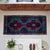 Authentic hand-knotted mini rug featuring turquoise and rust red tones with bold geometric Anatolian motifs — perfect for...