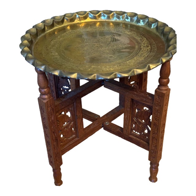 1960s Small Moroccan Engraved Brass Tray With Scalloped Top on Carved Stand For Sale