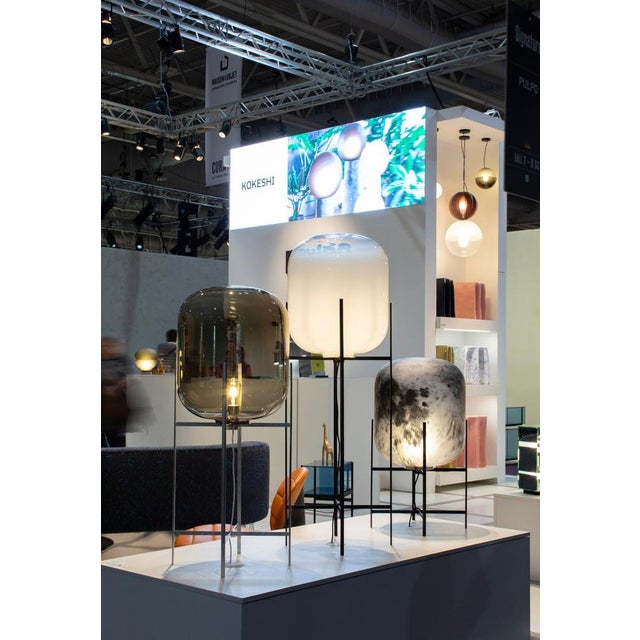 Designed by up-and-coming German designer Sebastian Herkner, Oda Medium is a floor lamp made from a handblown tinted glass...