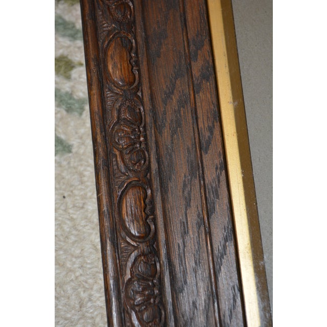 This carved frame / picture came from England a long time ago. Carved oak with a mounted B&W sketch of a woman. The script...