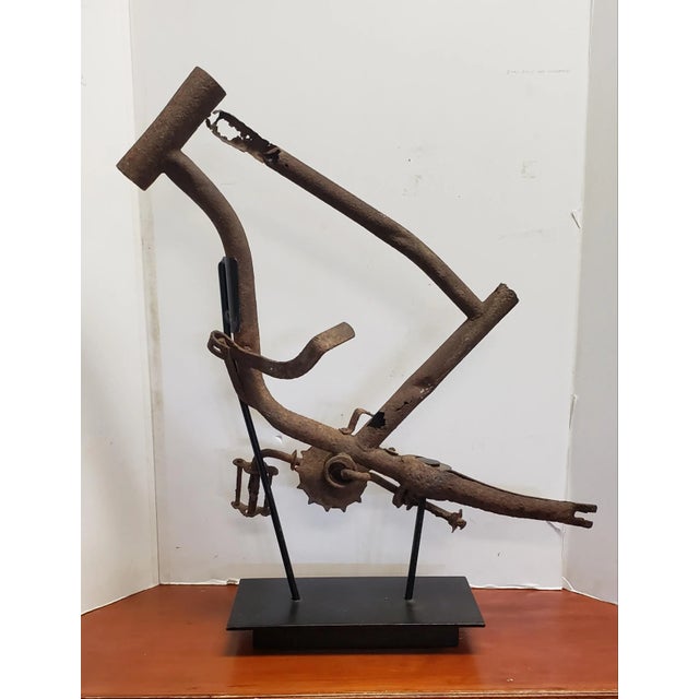 Vintage Bicycle Sculpture With Custom Stand, an Amazing display piece That will be a conversation piece in any displayed...