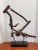 Vintage Bicycle Sculpture With Custom Stand, an Amazing display piece That will be a conversation piece in any displayed...