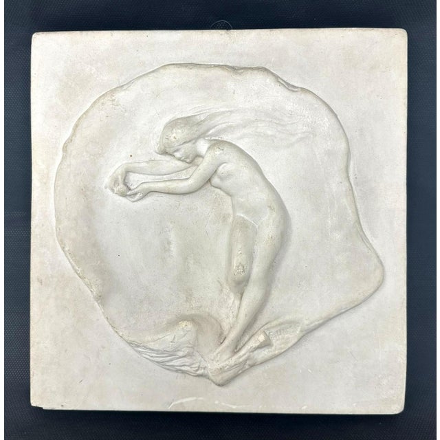 An exceptionally well cast English Porcelain or Ceramic Wall Plaque depicting a standing Female Nude holding a ball,...