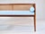 A solid walnut Mid-Century Modern window bench or settee attributed to Edward Wormley for Dunbar. Lithe line design...