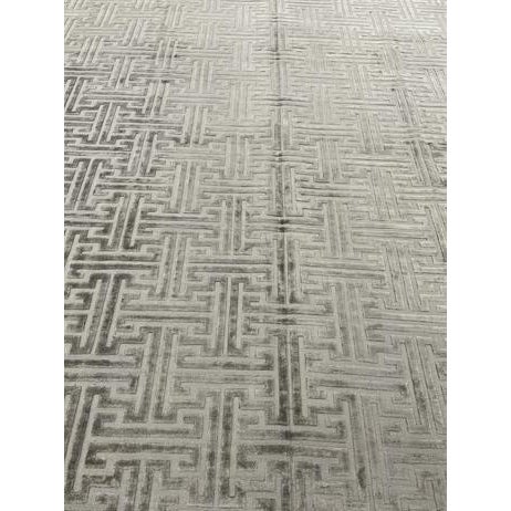 Beautiful handloom rug. Made of viscose & cotton with very modern design and colors, this extremely gorgeous rug is an...