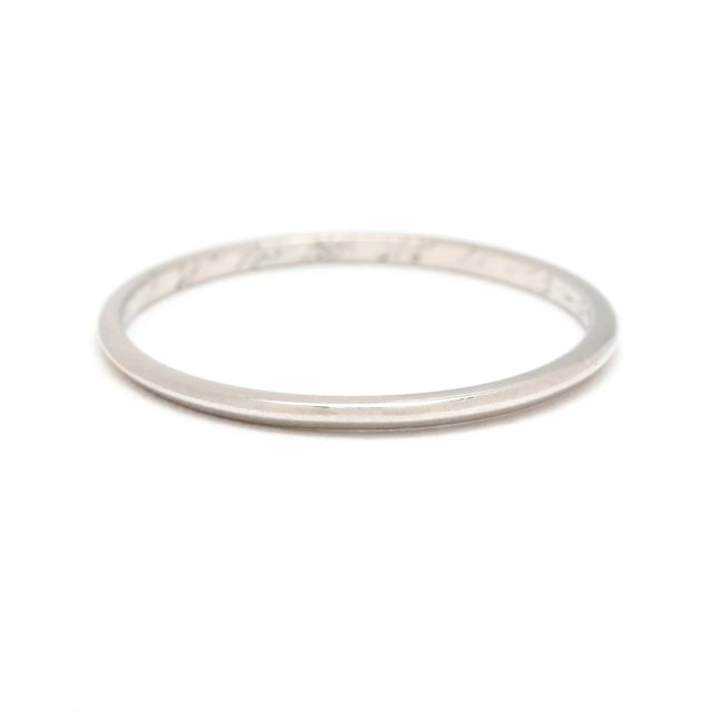 Ring Size 6.5 Rise Off Of Finger: 1 mm Width: 1.2 mm Weight: .8 dwts. / 1.2 grams Stamps: "Plat" SKU: R3835 A Couple Of...