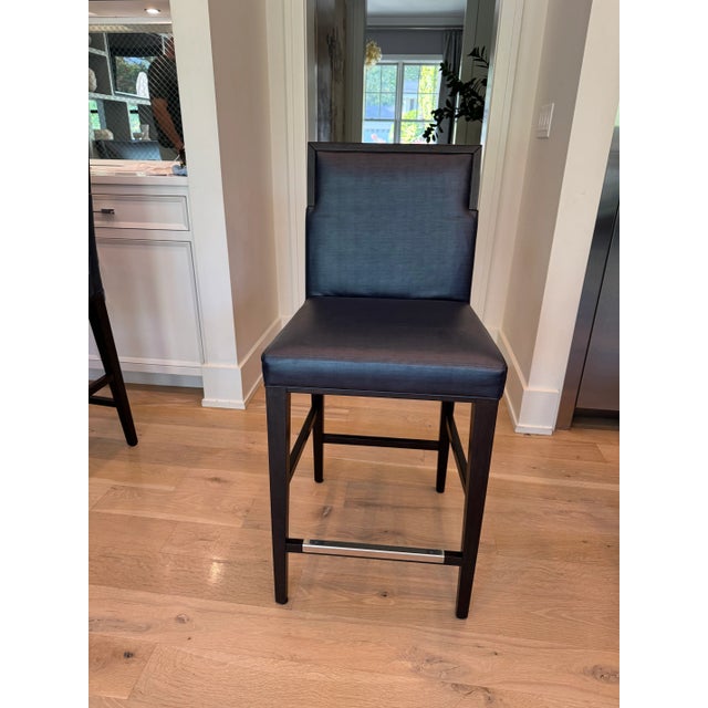 Beautiful and great condition set of 3 Concept bar stools by Constantini Pietro. Dark wood frame with metal foot guard and...