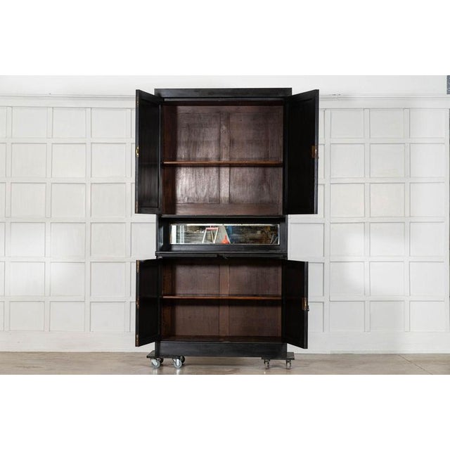 Circa 1880 large 19thc english ebonised mirrored mahogany cabinet together w121 x d46.5 x h237.5 cm base w117 x d46.5 x...