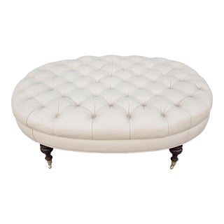 Chesterfield Large Oval Button Tufted Beige Leather Ottoman on Brass Casters For Sale