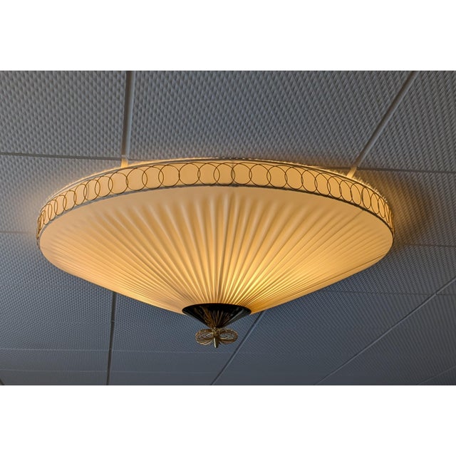 The ceiling lamp was manufactured by Oy Valinte in Finland in the 1950s. Model number 1241. The lamp has a beautiful...