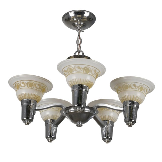 1930s Traditional style nickel plated brass chandelier with white and yellow-y beige etched glass shades. This light...