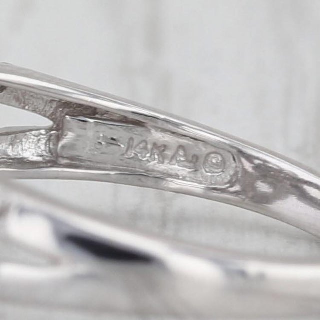 Gemstone Information: - Natural Diamonds - centers Total Carats - 0.12ctw Cut - Round Brilliant Color - F - G Clarity -...