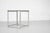Dining table, model "PK58": white polyester composite top, brushed aluminum base. Designed by Poul Kjaerholm for Fritz...