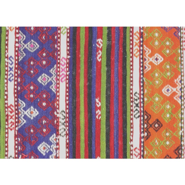 The Vintage Turkish Kilim is a hand-woven rug from the Oushak region of Turkey. Made with wool on a wool foundation, this...