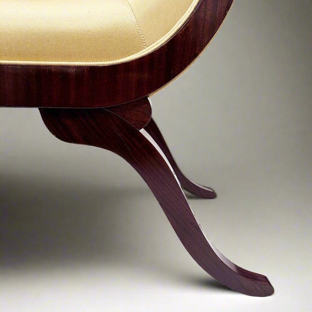 A fine pair of Belle Epoque period hardwood benches from France circa 1890. The luscious curved silhouette is visible from...