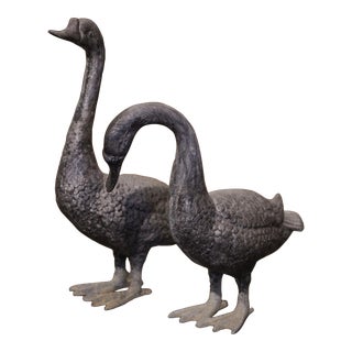 Pair of Mid-Century French Patinated Cast Metal Goose Sculptures For Sale