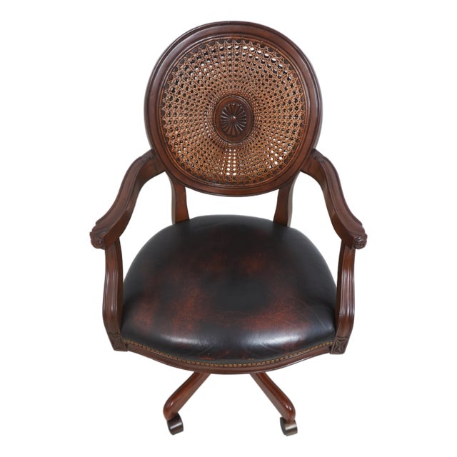 Vintage French Carved Cane Back Swivel Leather Desk Chair For Sale