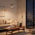 The FLEUR Arc Lamp is a Modern arc lamp with a Satin Nickel steel body and base, featuring a Matte Black/Silver steel...