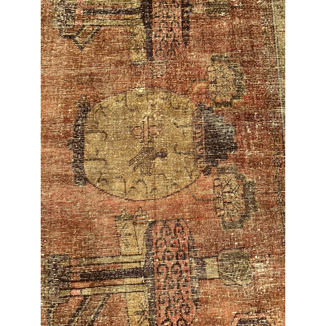 This distinctive antique Samarkand rug, measuring approximately 8'2" x 5'1", features an unusual pictorial composition...