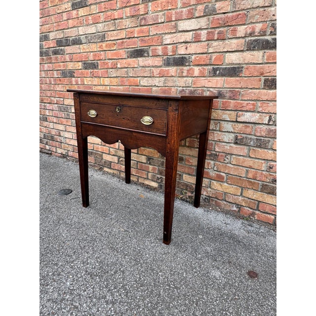 This solid wood French side table with tapered legs and decorative apron would make such a timeless and lovely addition to...