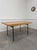This table, designed by Alain Richard (stamp present under the tabletop) and made in the 1950s, perfectly illustrates the...