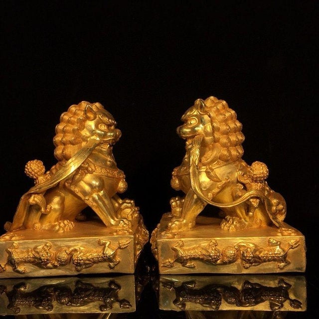 Asian Pair of Gilt Bronze Guardian Lions – 7.9" Foo Dogs on Dragon Relief Bases With Xuande Mark For Sale - Image 3 of 9