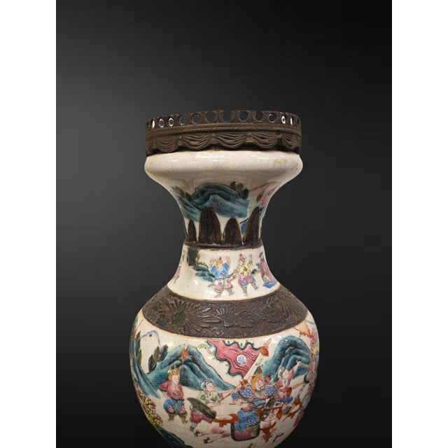 Qing dynasty, Guangxu period (1875–1908), late 19th century A characterful baluster vase of the celebrated “Nanking”...