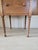 This is a Martha Washington style sewing cabinet with it’s distinctive oval shape with hinged side flaps that open to...