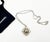 Chanel Silver CC Argyle Crystal Pendant Necklace *Marked 05 *Made in France *Comes with the original dust bag -It is...