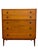 This vintage Mid Century Modern five-drawer dresser is attributed to John Van Koert for Drexel and reflects the clean-...