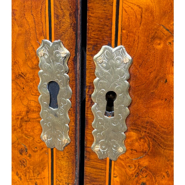 An Extremely Charming George I Period Burr Elm And Walnut Bowfronted, Wall Hanging, Corner Cupboard, Having Superbly...