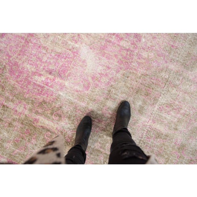 :: Concentric center medallions with scrolling scalloped contour atop a covered field of floral tendrils, blossoms, and...