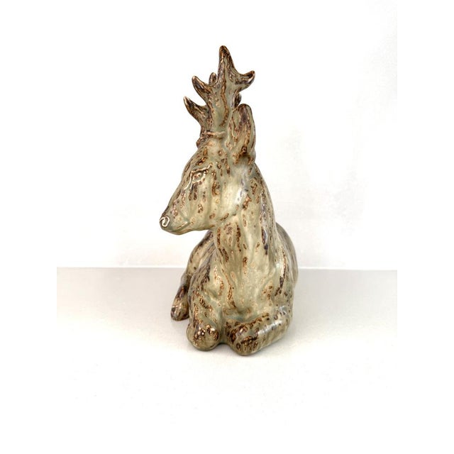 Cervo Figure by Knud Kjhn for Royal Copenhagen, 1940s, in Very Good conditions. Designed 1920 to 1949 This piece has an...