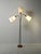 1950s floor lamp with a wooden base, black stems, and brass accents; three arms on goosenecks; remade lampshades. 1950s...