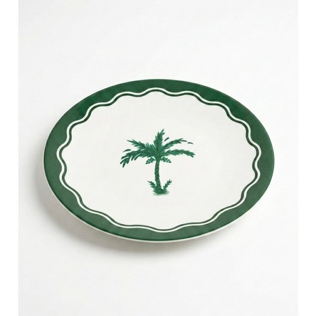 This charming ceramic dinner plate features a classic tropical aesthetic, perfect for adding a touch of coastal elegance...