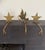 Set of three vintage solid brass (heavy) fireplace mantel stocking holders in the shape of 2 stars and 1 bird. Each holder...
