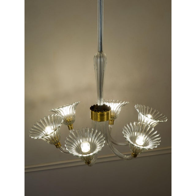 Vintage Murano blown glass chandelier, made in Italy in the 1940s at the Barovier & Toso furnaces. The central section is...