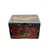 This vintage Chinese trunk features a vibrant, hand-painted Guardian Lion (Foo Dog) rendered in shades of emerald green...
