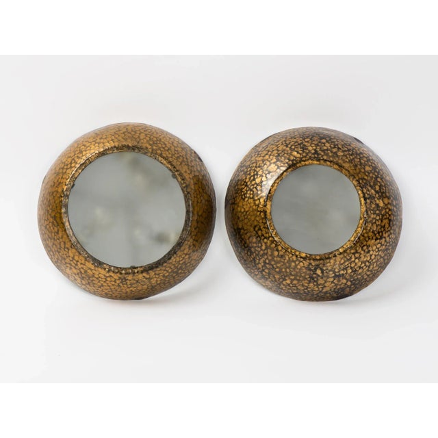 A pair of vintage 3-Lights wall sconces in gilt metal and frosted glass. Hand made, Spain, circa 1950s. They have...