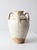 This vintage handmade studio pottery vase features a sculptural Mediterranean amphora form with four loop handles, a...