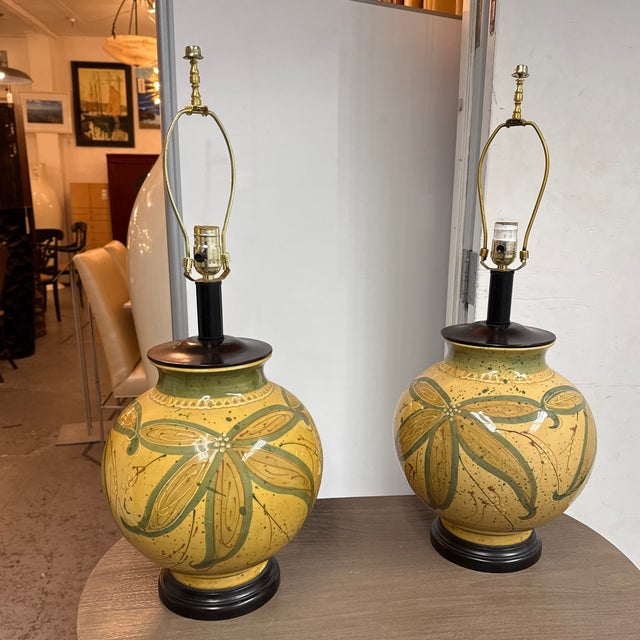 Design Plus Gallery presents a Pair of Botanical Ceramic Ginger Jar Table Lamps. The rounded ceramic bases showcase a...