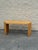 Vintage console table executed in split reed, with a geometric parquet-style top composed of angled reed segments.