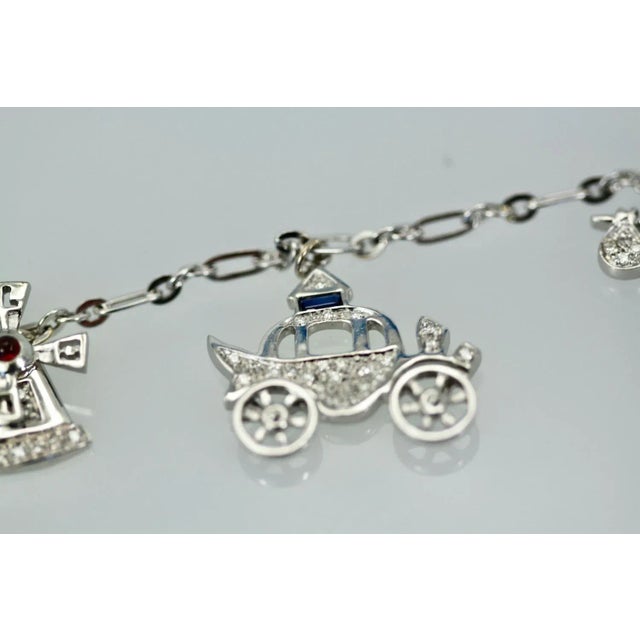 This is part of Chairish’s Fine Jewelry assortment. Deco Platinum Charm Necklace This gorgeous Deco Platinum charm...