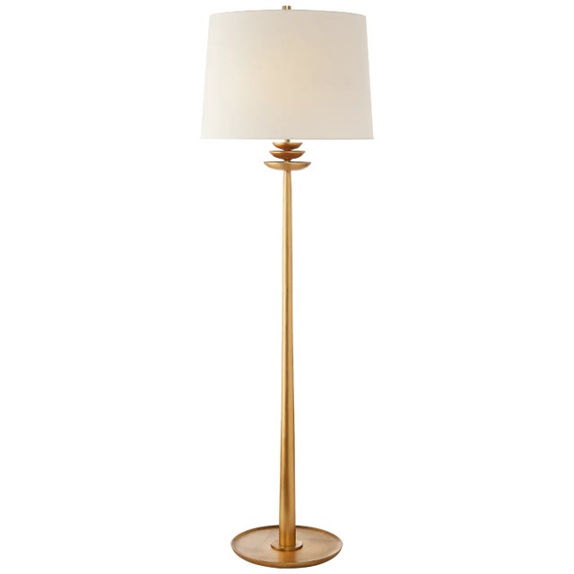 Beaumont Floor Lamp in Gild with Linen Shade Designer: AERIN Height: 62.75" Shade Detail: 18" x 20" x 14" Linen Base:...