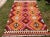 This beautiful, vintage, handwoven kilim is approximately 70 years old. It is handmade of very fine quality, hand-spun...