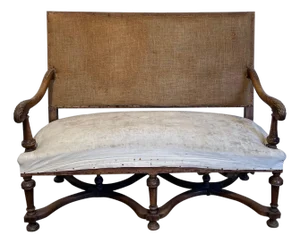 High-backed walnut sofa. French work in the style of Louis XIII. Circa 1880