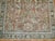 An early 20th century Persian Mahal weather appeal shabby chic rug in rustic tones. The field is terracotta, the border is...