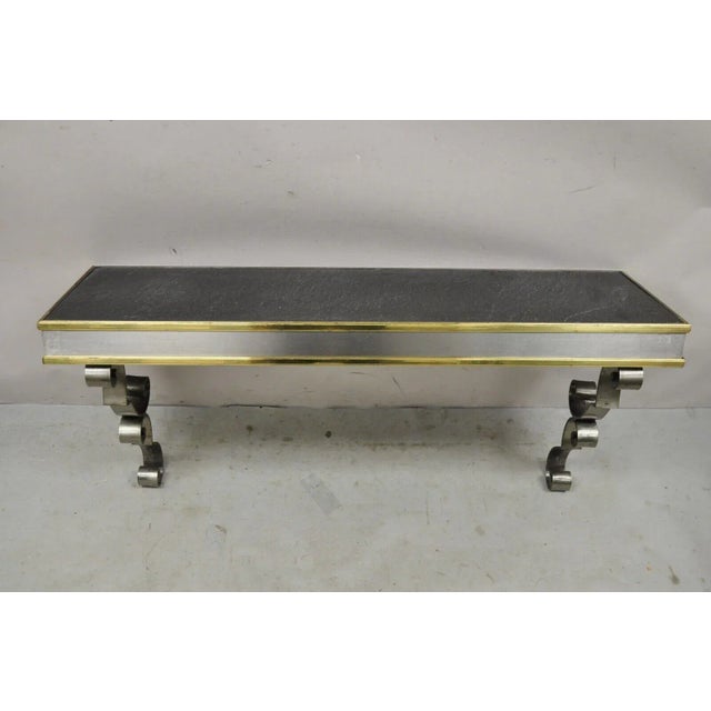 Vintage Italian Regency Steel and Brass Wall Mount Console Table with Slate Top. Item features has a Rectangular inset...