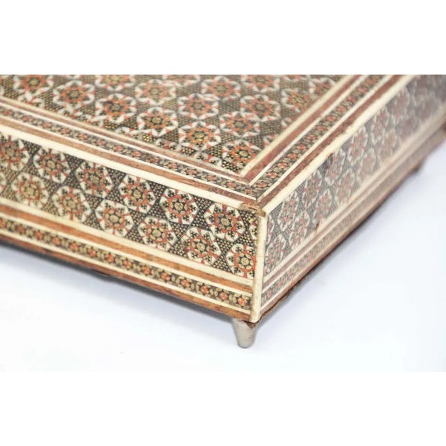 Middle Eastern Sadeli micro mosaic inlaid jewelry footed box with lid. Intricate inlaid box with floral and geometric...