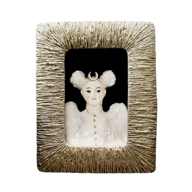 A colorful oil painting in a silver frame. 6.5"x8.25"